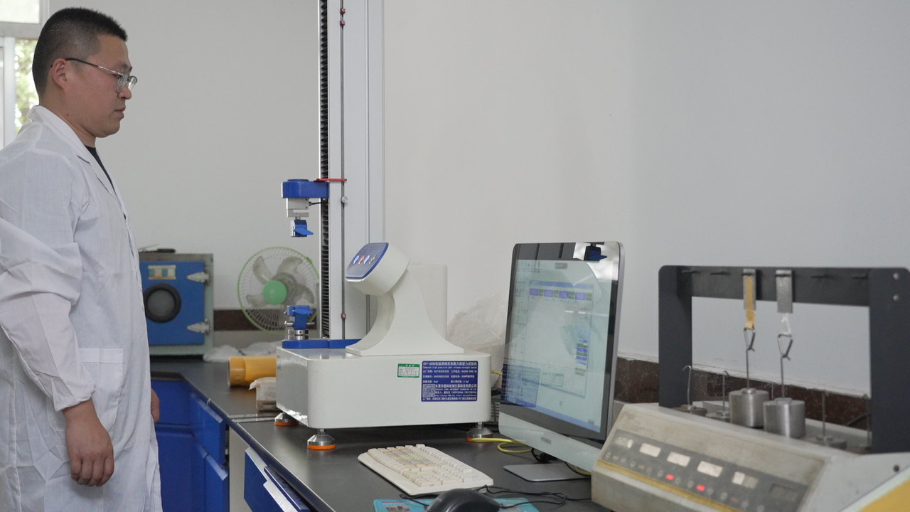 Laboratory inspection of adhesive tape